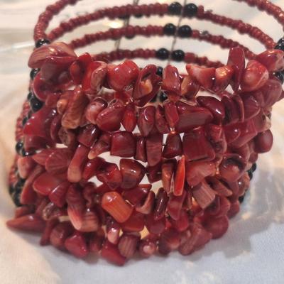 Sale Photo Thumbnail #1261: multistrand bracelet with seed beads and rock chips- red
