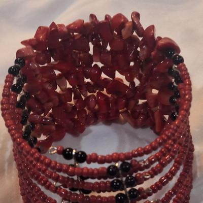 Sale Photo Thumbnail #1258: multistrand bracelet with seed beads and rock chips- red
