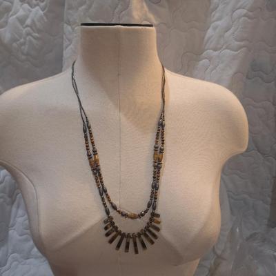Sale Photo Thumbnail #1298: long two stand necklace with brown beads and stones