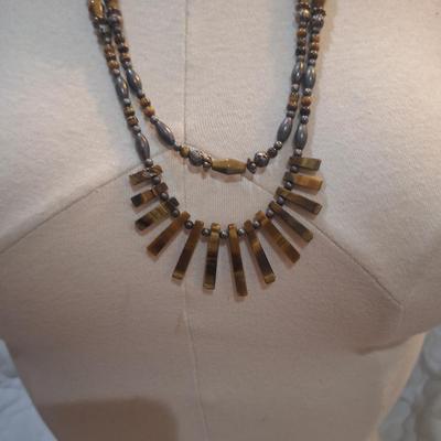 Sale Photo Thumbnail #1299: long two stand necklace with brown beads and stones