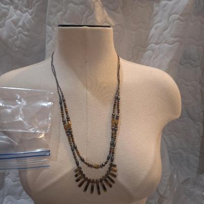 Sale Photo Thumbnail #1296: long two stand necklace with brown beads and stones