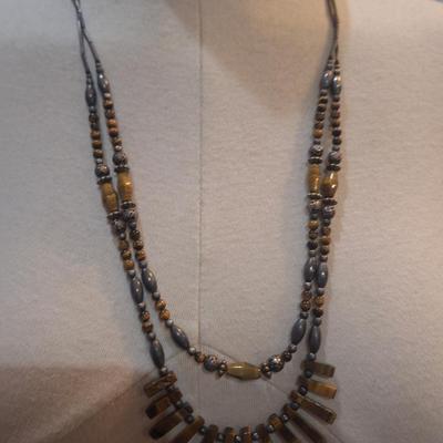Sale Photo Thumbnail #1295: long two stand necklace with brown beads and stones