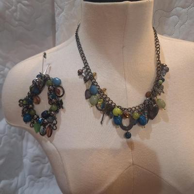 Sale Photo Thumbnail #1314: necklace with matching bracelet- multicolored charms or bangles