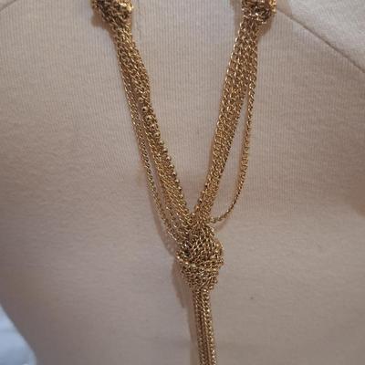 Sale Photo Thumbnail #1389: Long gold tone necklace