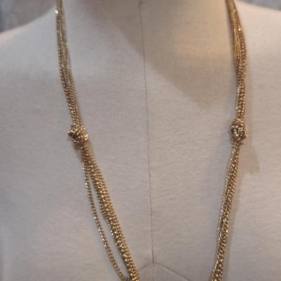 Sale Photo Thumbnail #1390: Long gold tone necklace