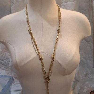 Sale Photo Thumbnail #1388: Long gold tone necklace