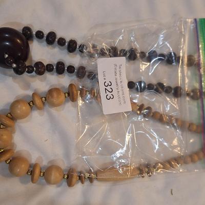 Sale Photo Thumbnail #1393: 2 wooden beaded necklaces
