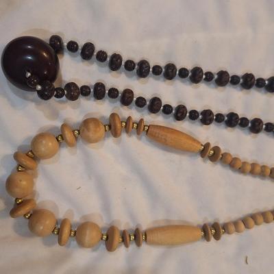 Sale Photo Thumbnail #1394: 2 wooden beaded necklaces