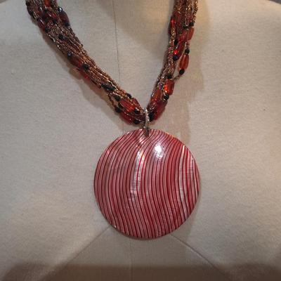 Sale Photo Thumbnail #1415: beaded necklace with large statement pendant- pinks and reds