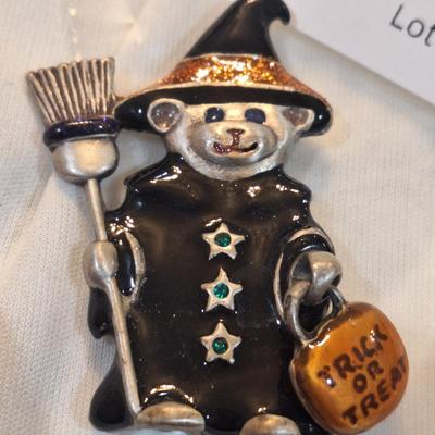 Sale Photo Thumbnail #1423: cute brooch of bear in witches outfit trick or treating for Halloween.