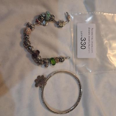 Sale Photo Thumbnail #1435: charm bracelet with charms for son and daughter and other pretty charms