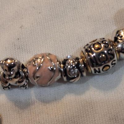Sale Photo Thumbnail #1432: charm bracelet with charms for son and daughter and other pretty charms