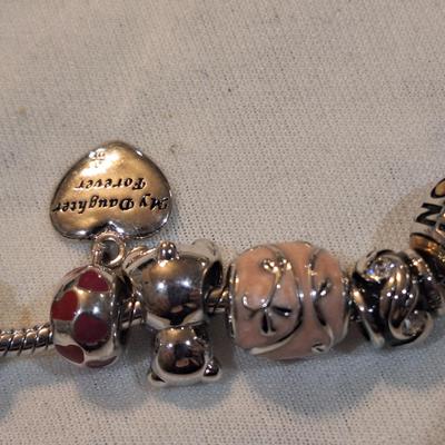 Sale Photo Thumbnail #1430: charm bracelet with charms for son and daughter and other pretty charms