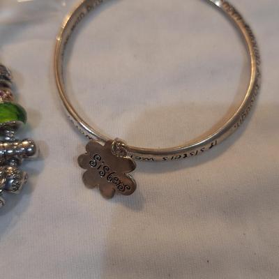 Sale Photo Thumbnail #1427: charm bracelet with charms for son and daughter and other pretty charms