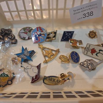 Sale Photo Thumbnail #1468: lapel pin bundle
plastic container not included
