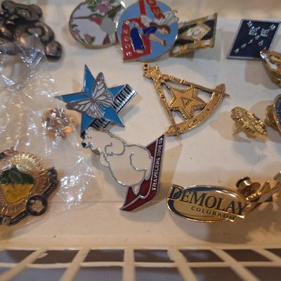 Sale Photo Thumbnail #1469: lapel pin bundle
plastic container not included