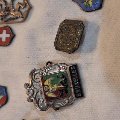 Sale Photo Thumbnail #1480: charms from various destinations and possibly some free mason related.