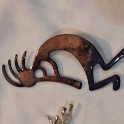 Sale Photo Thumbnail #1503: Kokopelli Brooch, enamel Zuni pin and smaller lapel pin