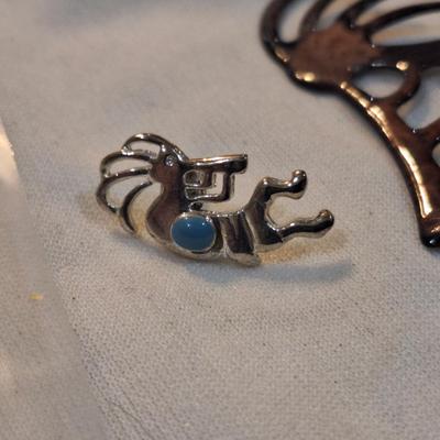 Sale Photo Thumbnail #1502: Kokopelli Brooch, enamel Zuni pin and smaller lapel pin