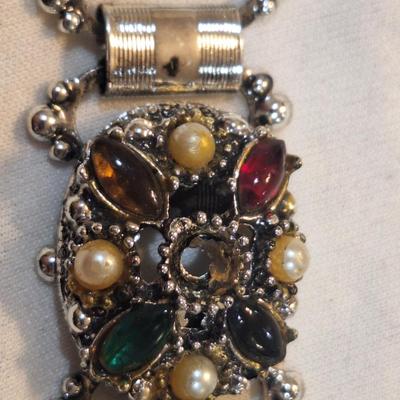 Sale Photo Thumbnail #1534: see photos.  in first picture at the top near the clasp the large center stone is missing.  You have to look to notice it.