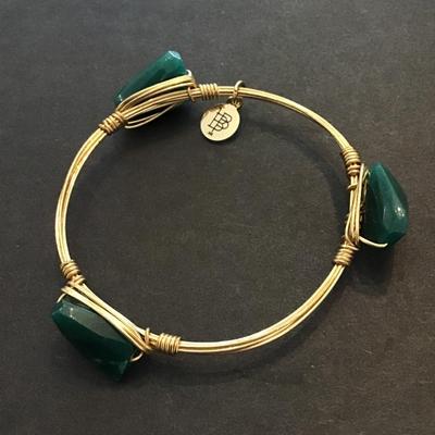 Bourbon and Boweties gold tone bangle bracelet