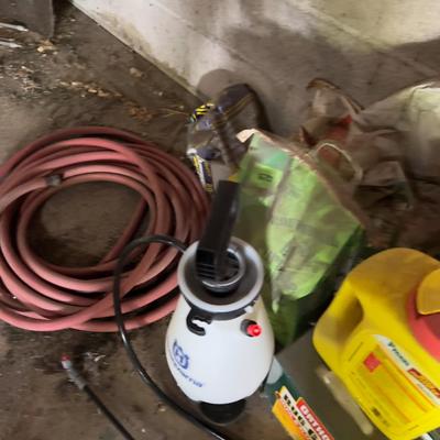 All the Fertilizers and Bug Killers. - (garage)