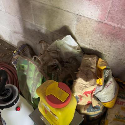 All the Fertilizers and Bug Killers. - (garage)