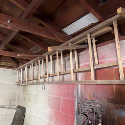 2 Wooden Ladders. Both 10 foot long - - (garage)