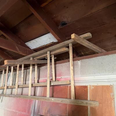 2 Wooden Ladders. Both 10 foot long - - (garage)