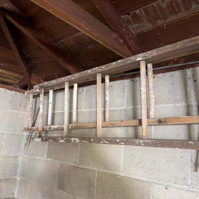 2 Wooden Ladders. Both 10 foot long - - (garage)
