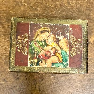 Sale Photo Thumbnail #497: Top is decorated with a religious motif, wear adds to the charm.  Made in Italy.