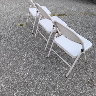 3 metal folding chairs