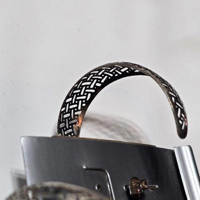 Silver tone Necklace Chain with several pairs of pierced earrings and silver tone bangle bracelet