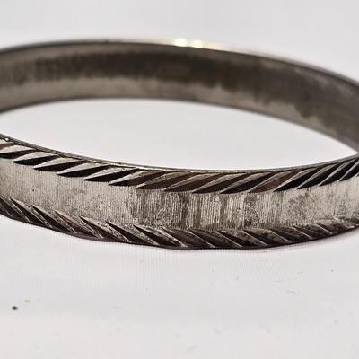 Silver tone Necklace Chain with several pairs of pierced earrings and silver tone bangle bracelet