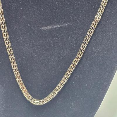 Silver tone Necklace Chain with several pairs of pierced earrings and silver tone bangle bracelet