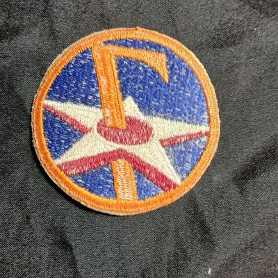 Short "The 7th Air Force" softcover WWII Unit History Book and an Original WW2 Vintage 7th Air force patch