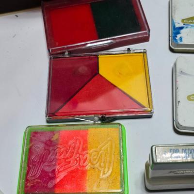 Stamping craft - Stamp Ink pads in an assortment of colors and sizes - stamping tools - and a few rubber stamps with canvas box