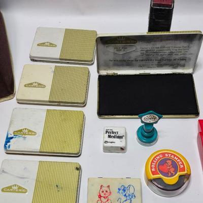 Stamping craft - Stamp Ink pads in an assortment of colors and sizes - stamping tools - and a few rubber stamps with canvas box