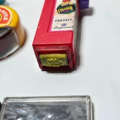 Stamping craft - Stamp Ink pads in an assortment of colors and sizes - stamping tools - and a few rubber stamps with canvas box