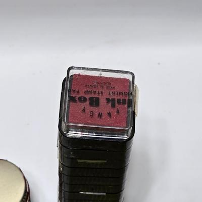 Stamping craft - Stamp Ink pads in an assortment of colors and sizes - stamping tools - and a few rubber stamps with canvas box