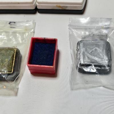 Stamping craft - Stamp Ink pads in an assortment of colors and sizes - stamping tools - and a few rubber stamps with canvas box