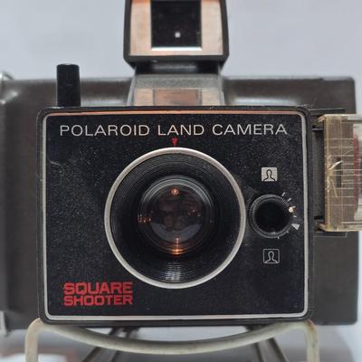 Vintage Polaroid Square Shooter land camera with distance finder and focused Flash in original box with contents and new sealed film.