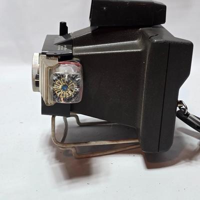 Vintage Polaroid Square Shooter land camera with distance finder and focused Flash in original box with contents and new sealed film.