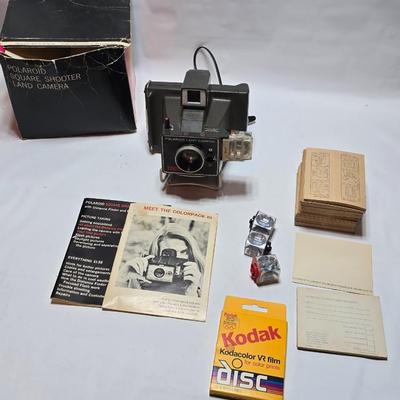 Vintage Polaroid Square Shooter land camera with distance finder and focused Flash in original box with contents and new sealed film.