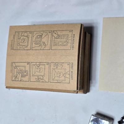 Vintage Polaroid Square Shooter land camera with distance finder and focused Flash in original box with contents and new sealed film.
