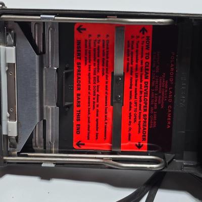 Vintage Polaroid Square Shooter land camera with distance finder and focused Flash in original box with contents and new sealed film.