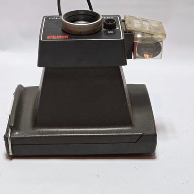 Vintage Polaroid Square Shooter land camera with distance finder and focused Flash in original box with contents and new sealed film.