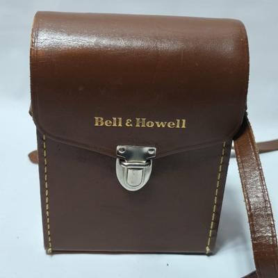 Beautifully clean Bell & Howell Two Twenty Vintage 8 mm Movie Camera with movie film and leather case