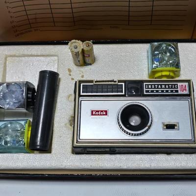 New old stock Kodak Instamatic camera 104 with Kodak Ektron electronic flash unit - Leather case