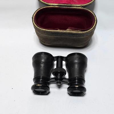 Antique opera glasses with leather case